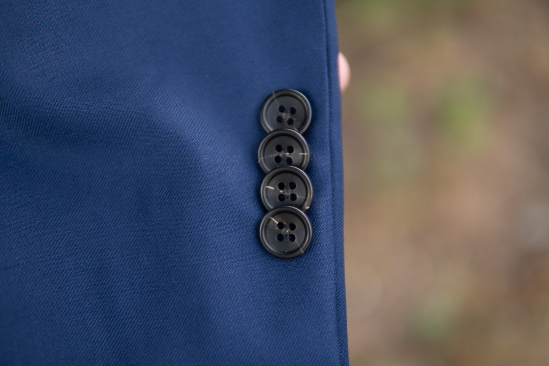 Kissing Suit Buttons